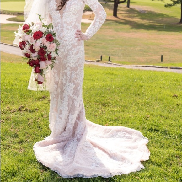 Petite long sleeve plunging v-neckline ivory lace wedding gown